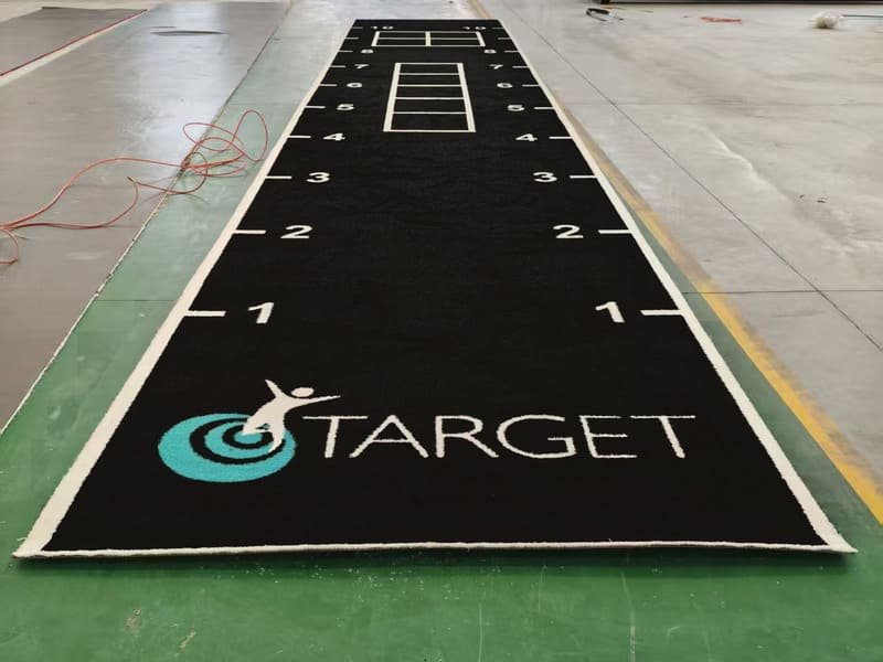 custom gym turf lanes with inlaid markings and logos